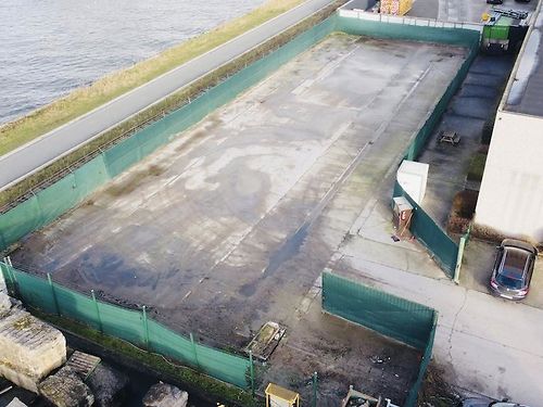 Verhard terrein voor buitenopslag in industriezone te Wondelgem