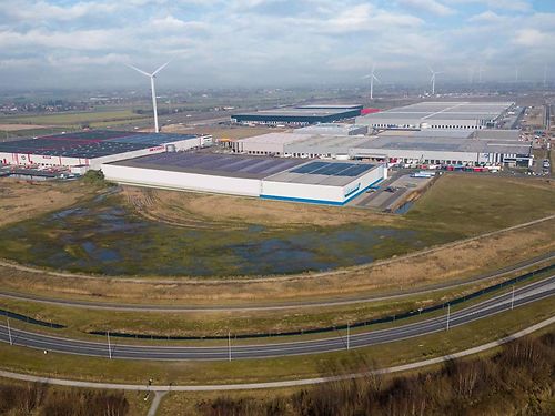 Nieuwbouwmagazijn in industriepark te Evergem
