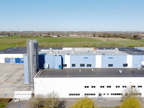 Site bestaande uit magazijnen en kantoren met mogelijkheid tot herontwikkeling in Komen, vlakbij de Franse grens